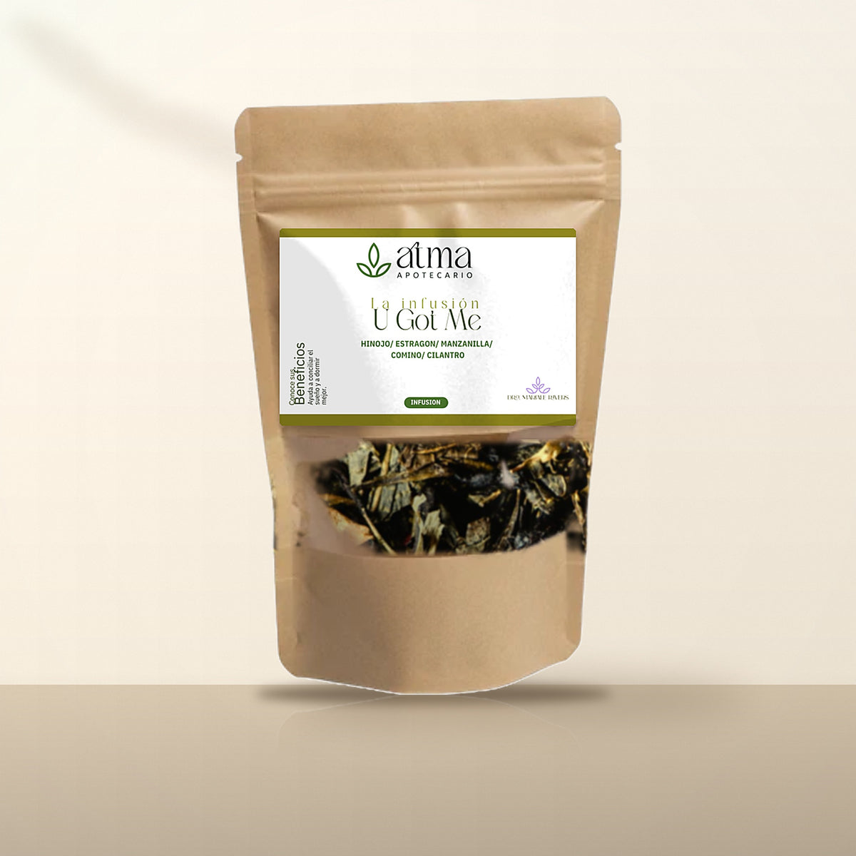 Infusión U Got Me de ATMA Apotecario en bolsa kraft con ventana, hierbas a la vista — hinojo, estragón, manzanilla, comino y cilantro